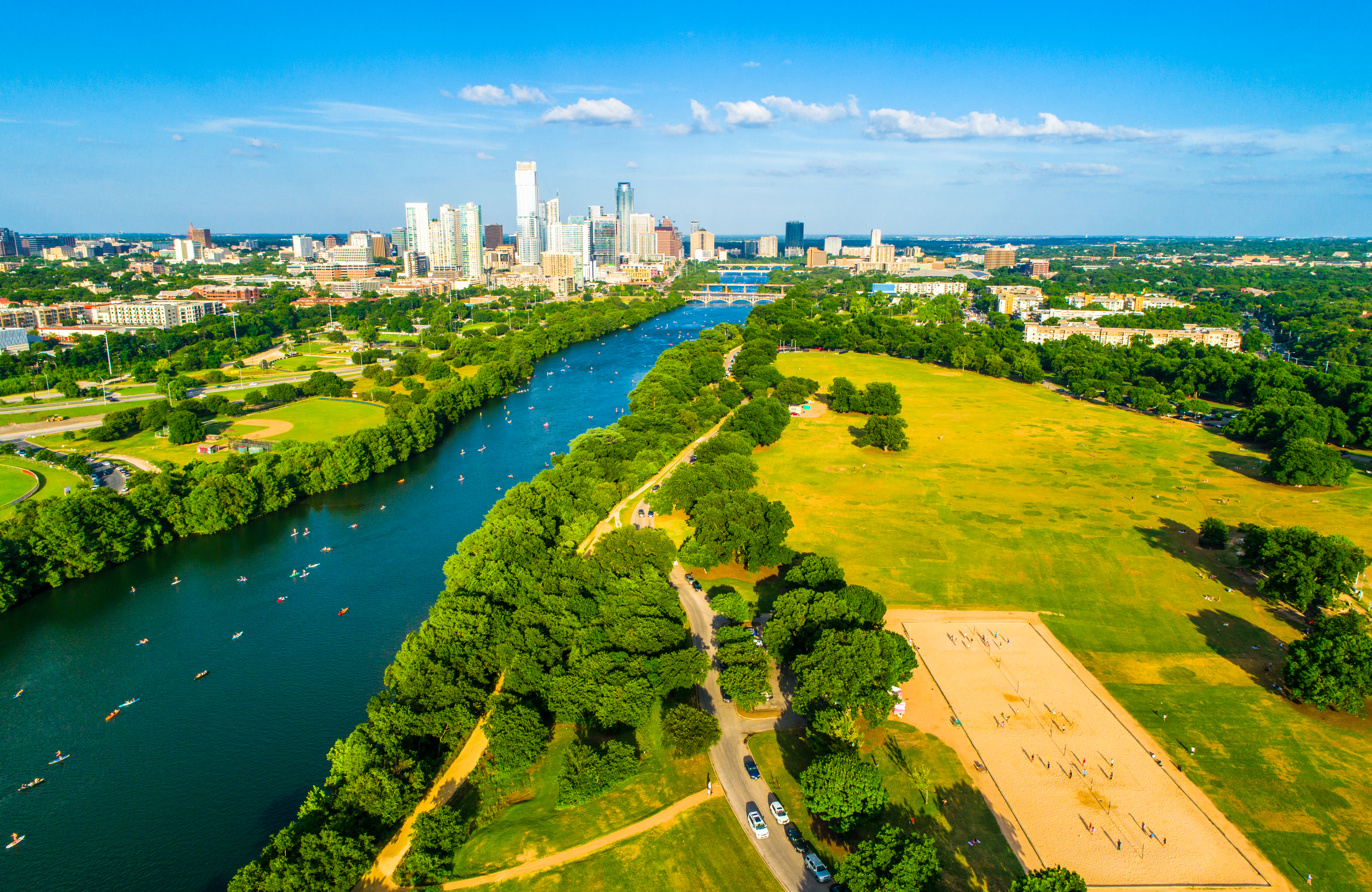 2019 aerial drone view above Austin, Texas — Zilker Park, Lady Bird Lake, and skyline (Getty Images/ RoschetzkyIstockPhoto)
