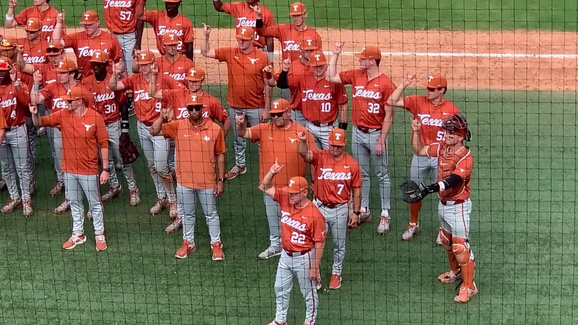 Texas players salute their fans after a 10-7 win over Central Florida on Sunday clinched the Longhorns' fifth consecutive Big 12 series victory. (KXAN photo)